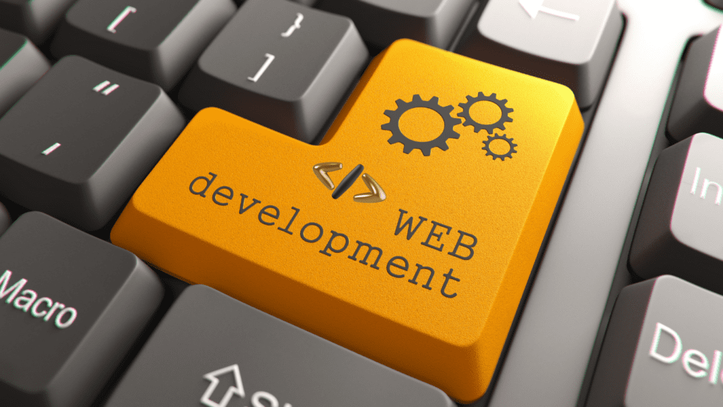 Snigdha Ghosh Digital Marketing Strategist integrating web development with marketing strategy, symbolized by a highlighted “Web Development” key on a keyboard for building high-conversion websites.